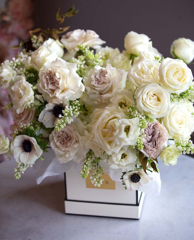 White Floral Arrangements, Spring Blossom - delicate arrangement of greens, roses