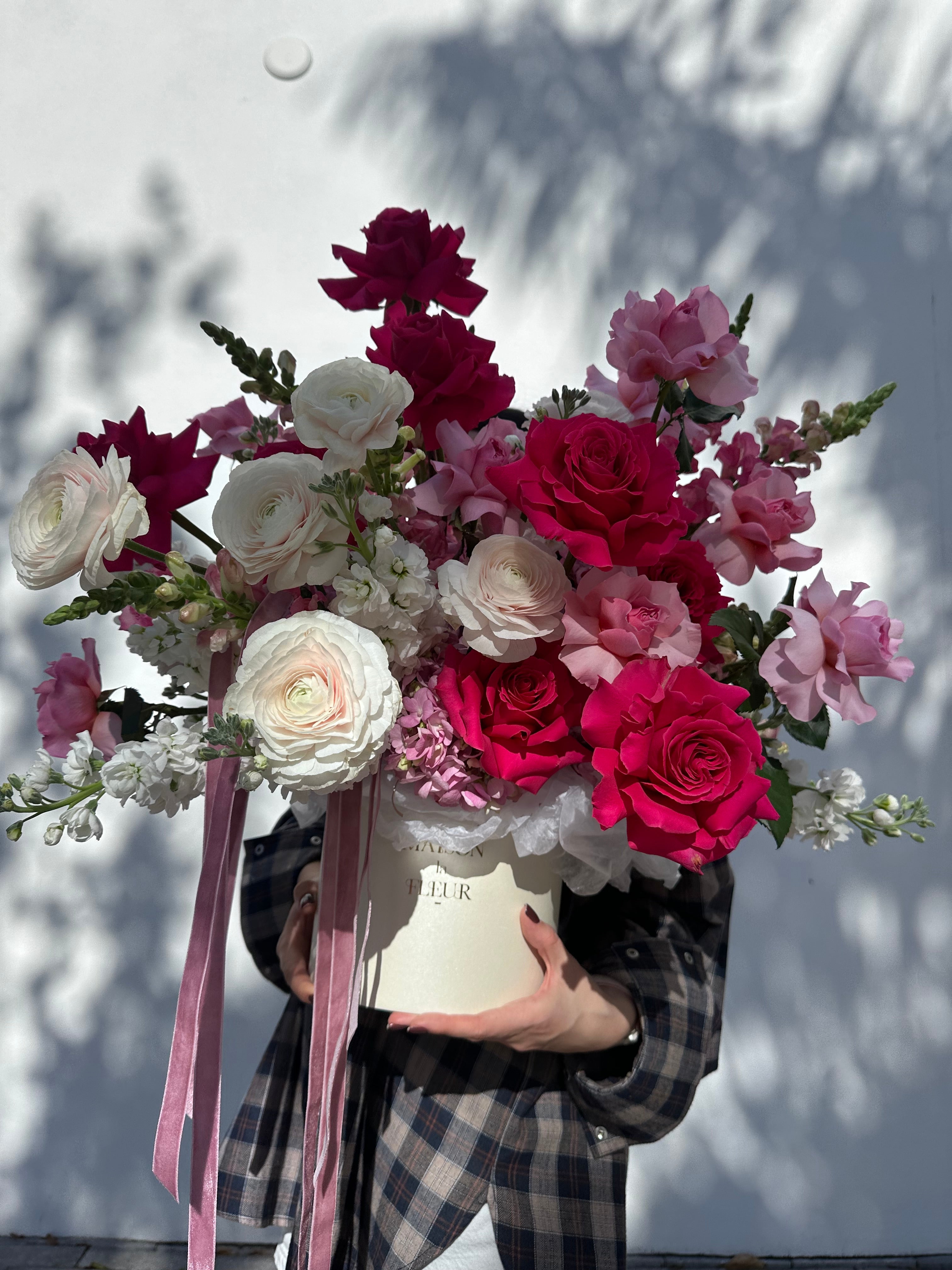 Hotter than pink - Beautiful box arrangement with premium long stem roses, ranunculus, hydrangea, garden roses and snap dragons