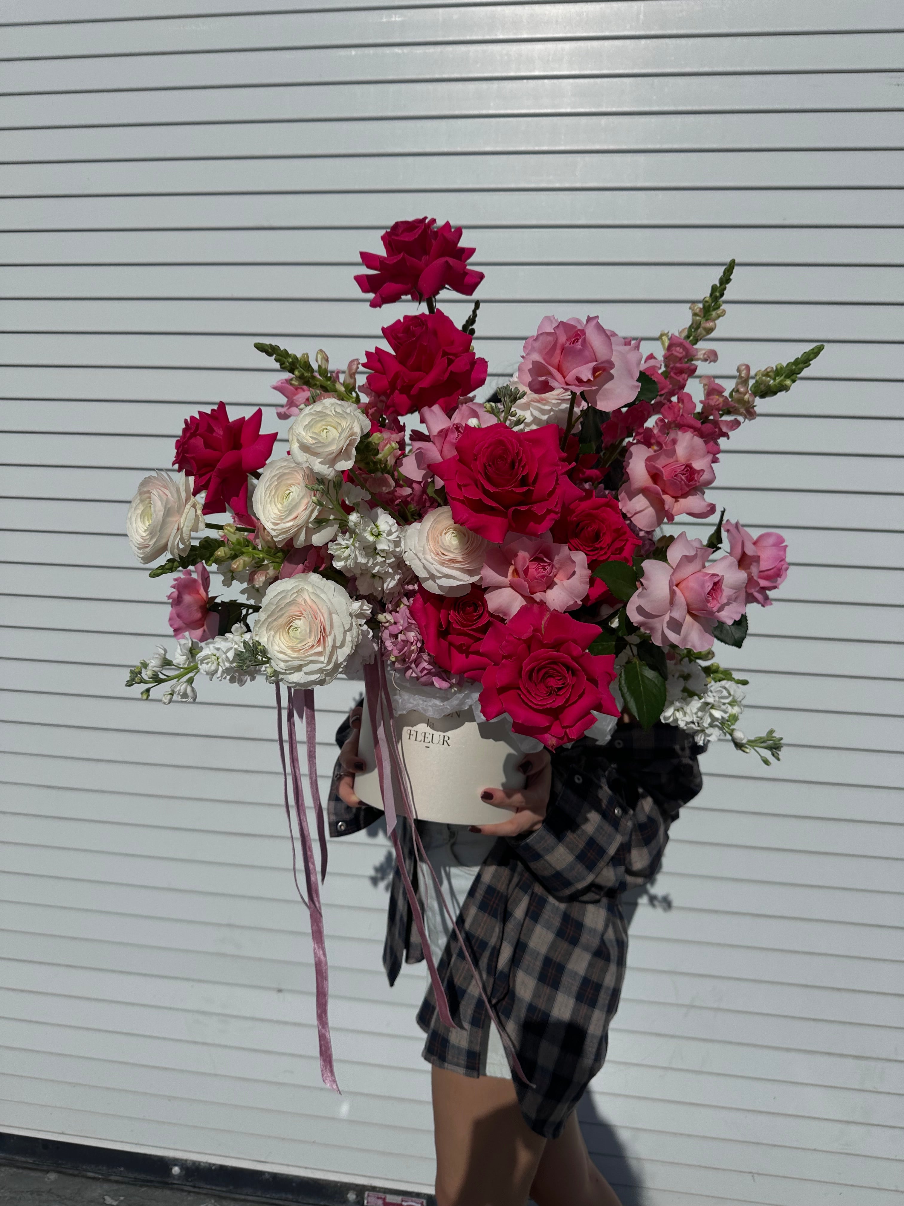 Hotter than pink - Beautiful box arrangement with premium long stem roses, ranunculus, hydrangea, garden roses and snap dragons