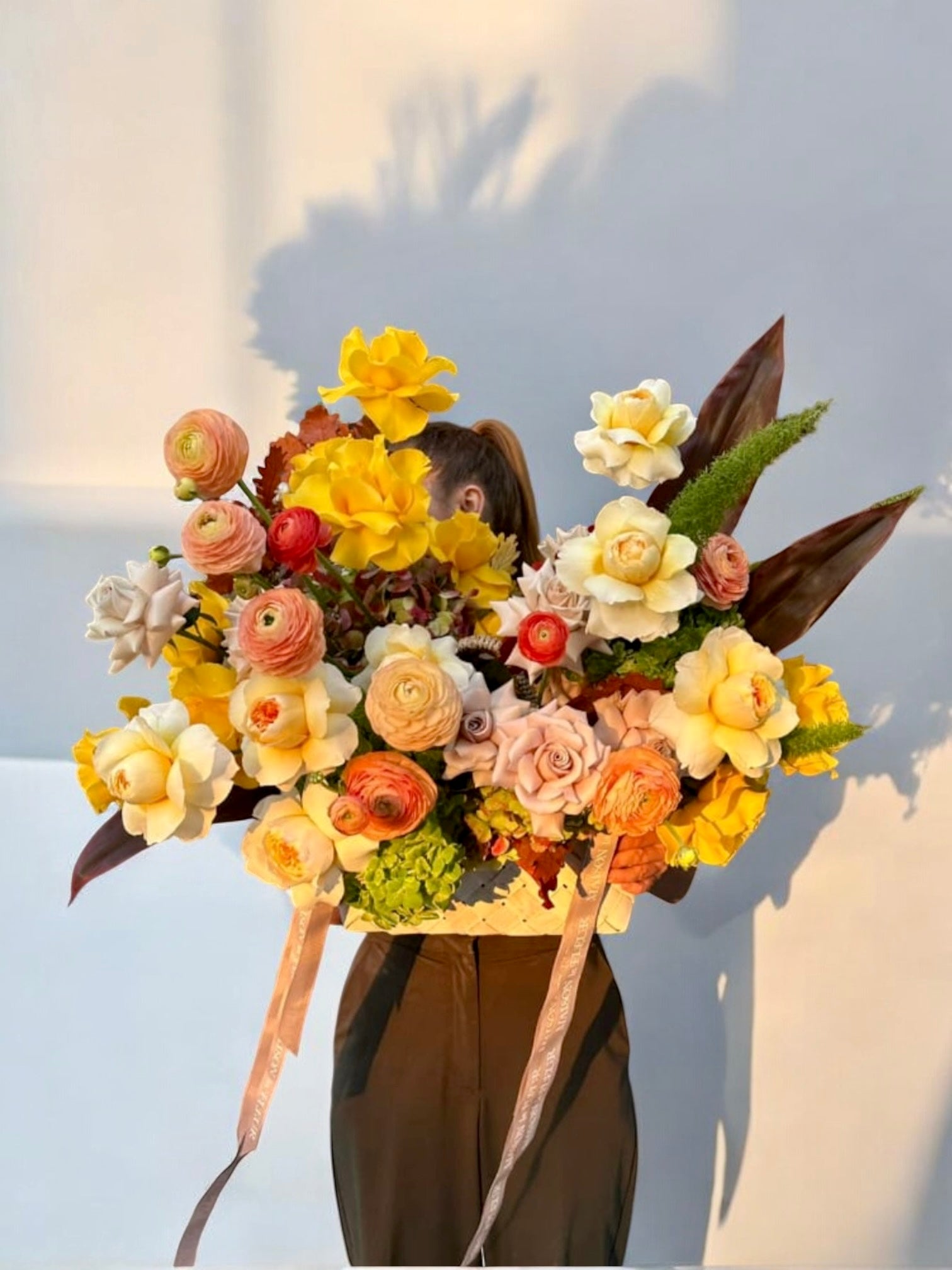 Dreams of Spring - Flower arrangement in Bottega style basket - Maison la Fleur