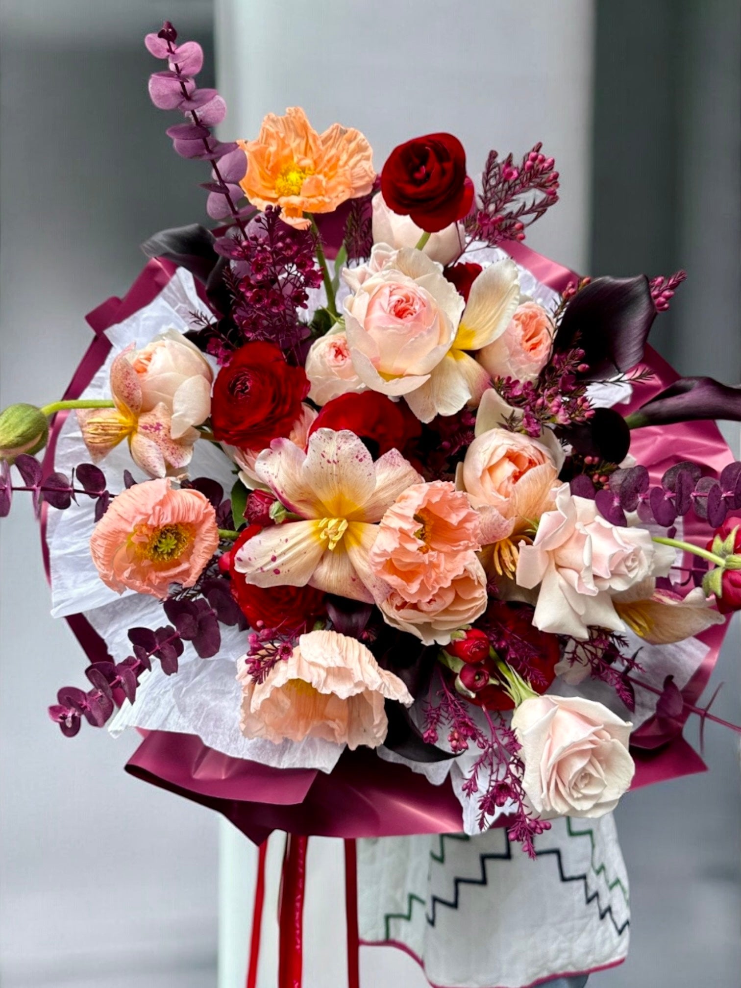 Fire and Ice - David Austin garden roses, italian poppies, mini calla, long stem roses, dyed eucalyptus - Maison la Fleur