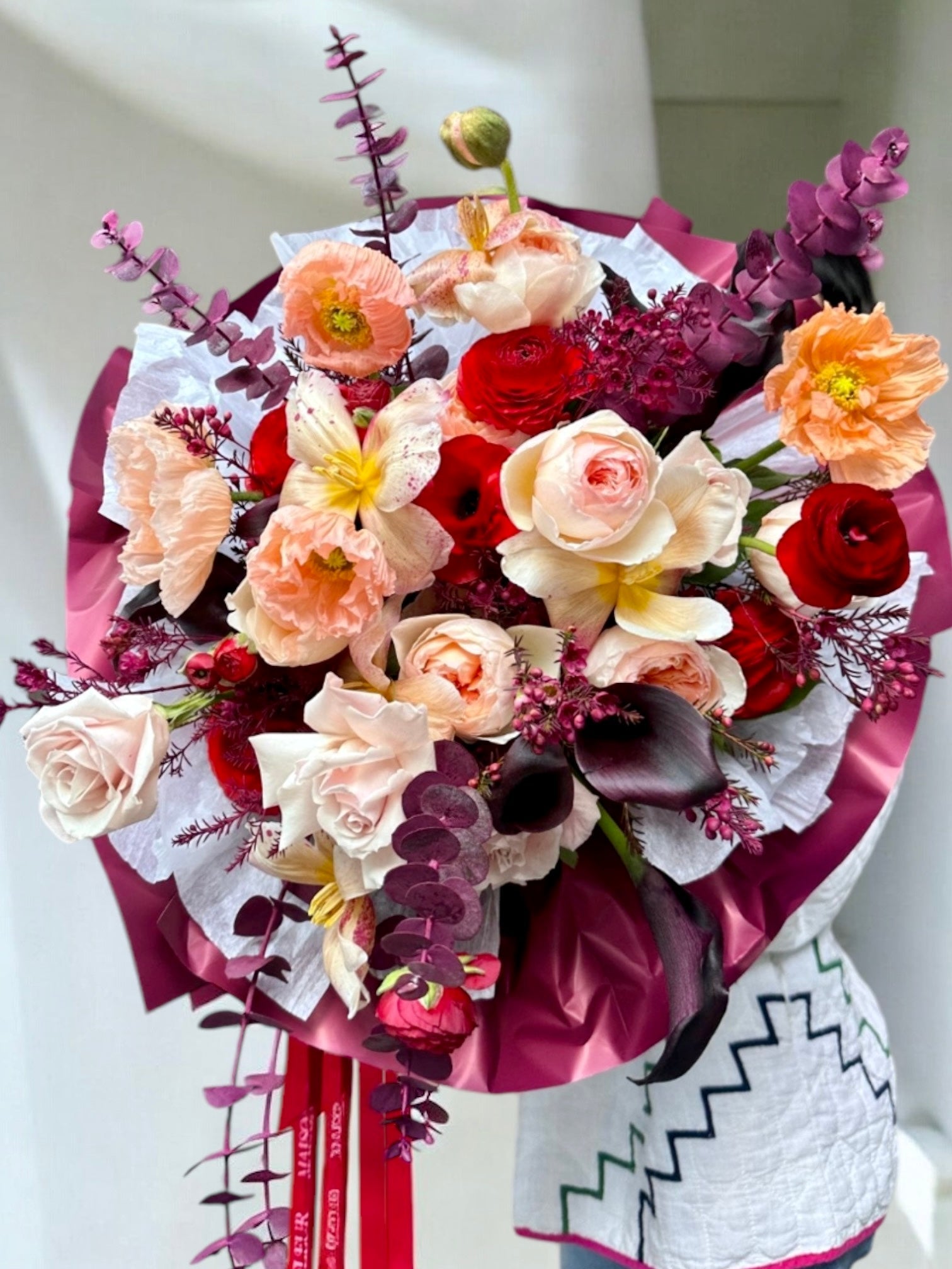 Fire and Ice - David Austin garden roses, italian poppies, mini calla, long stem roses, dyed eucalyptus - Maison la Fleur