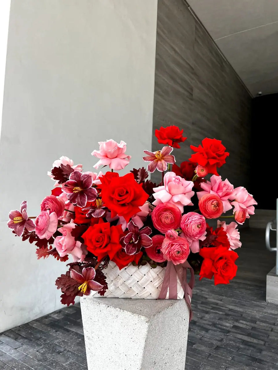 Hopelessly in Love - Flower arrangement in Bottega style basket ...