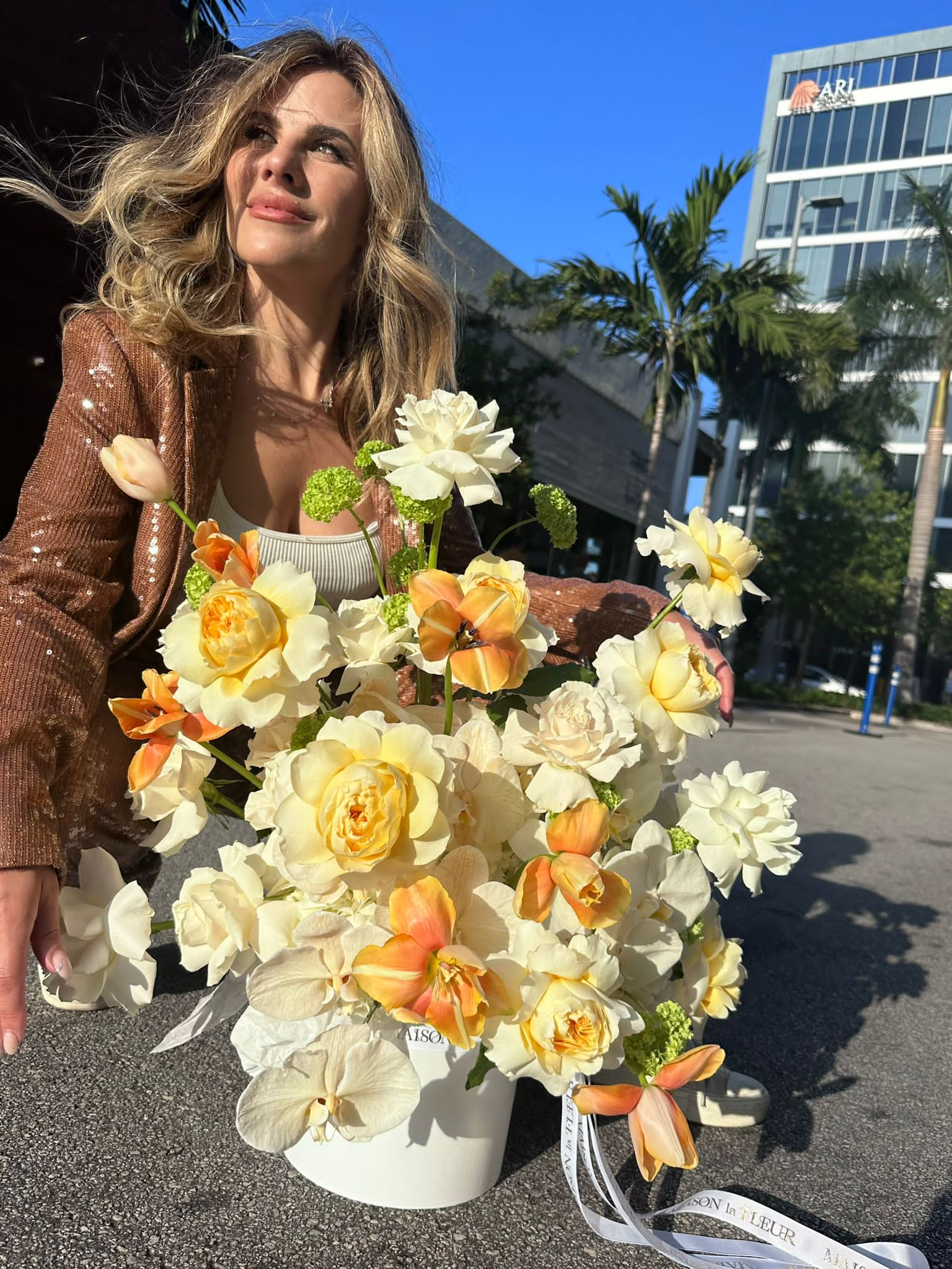 Malibu Sunset - David Austin fragrant garden roses, long stem roses, Dutch tulips , viburnum, Phaelonopsis, and hydrangea - Maison la Fleur