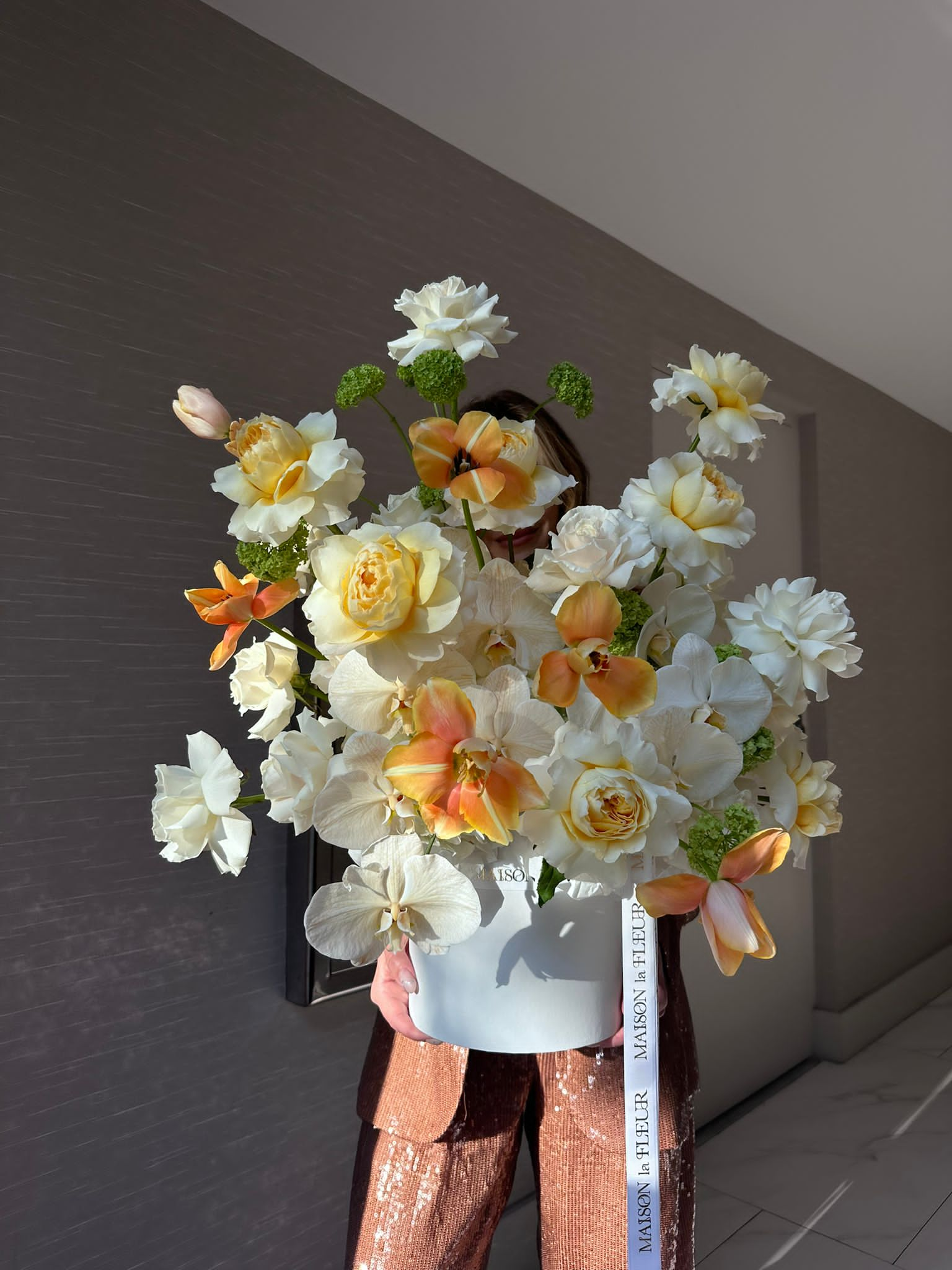 Malibu Sunset - David Austin fragrant garden roses, long stem roses, Dutch tulips , viburnum, Phaelonopsis, and hydrangea - Maison la Fleur