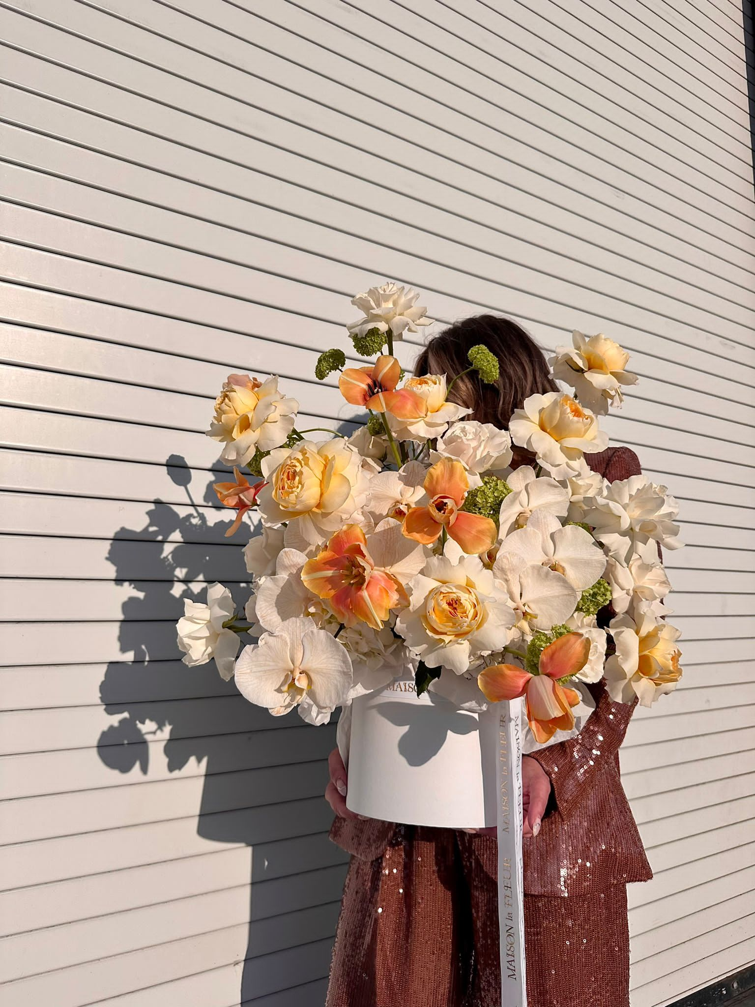 Malibu Sunset - David Austin fragrant garden roses, long stem roses, Dutch tulips , viburnum, Phaelonopsis, and hydrangea - Maison la Fleur