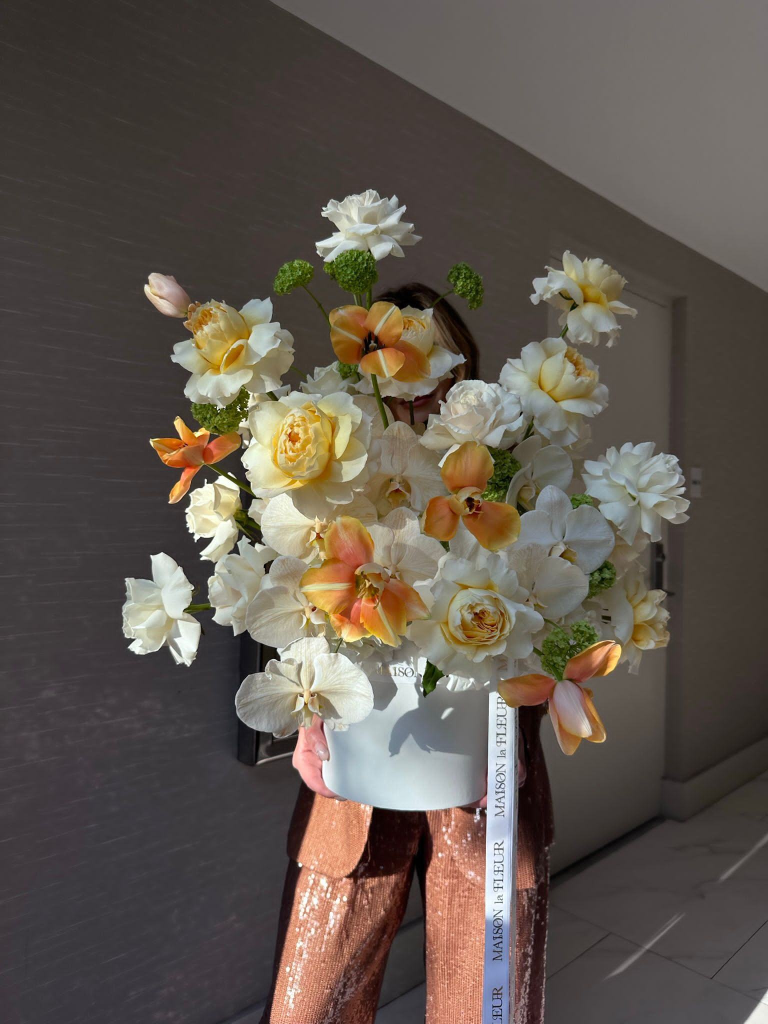 Malibu Sunset - David Austin fragrant garden roses, long stem roses, Dutch tulips , viburnum, Phaelonopsis, and hydrangea - Maison la Fleur