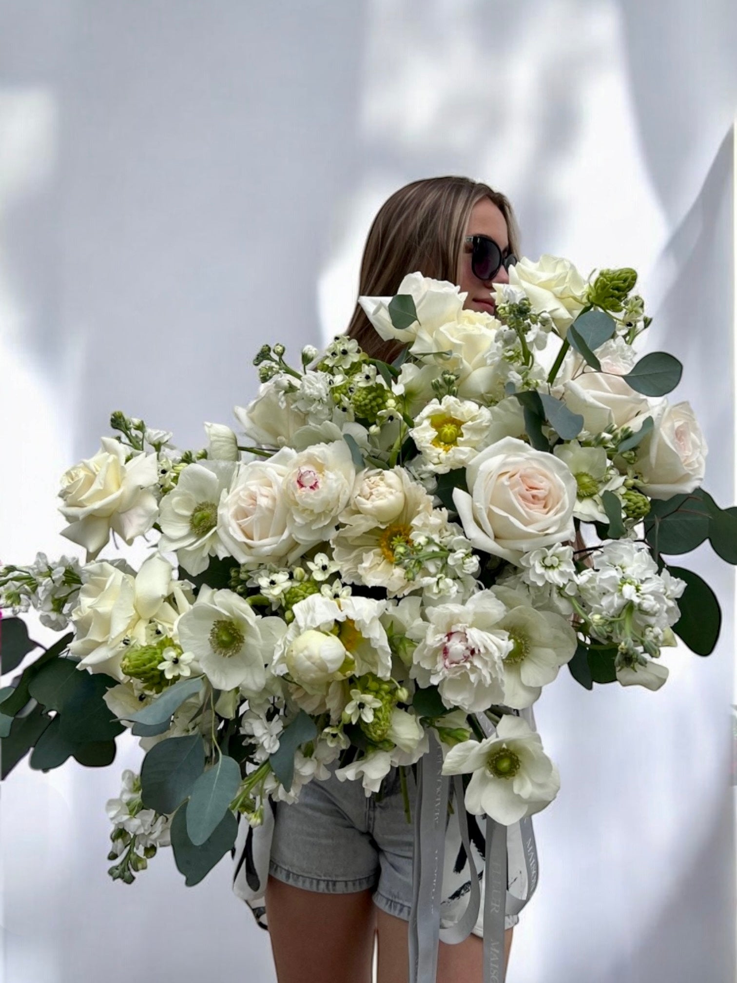 The Girl meets Green - Premium white O’Hara roses, peonies, stock flowers, anemones, puppies flowers, eucalyptus, and beautiful sweet pea flowers - Maison la Fleur